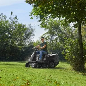 Alpina AT2 66 QA lawn tractor mowing the garden