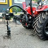 Tarières et grues de tracteur