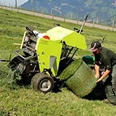 Round balers and round balers for tractors